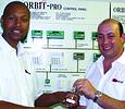 Joseph Mazibuko receiving his award from sales manager, Robin Albany